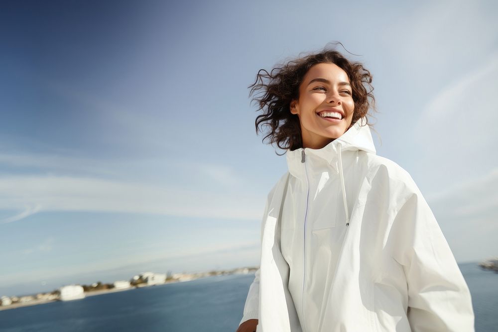 Woman wearing white jacket portrait smile adult. 