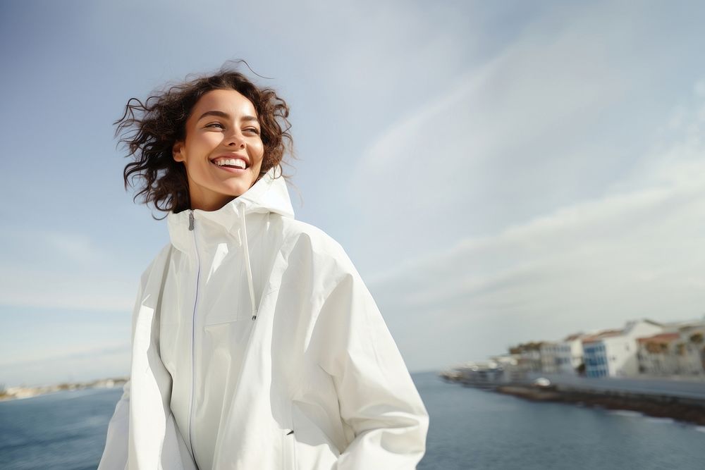 Woman wearing white jacket adult smile architecture. 