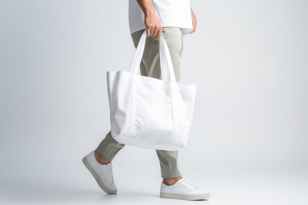 Tote bag carrying handbag adult. AI generated Image by rawpixel.