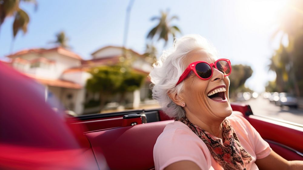 Eldery woman driving laughing outdoors glasses. AI generated Image by rawpixel.