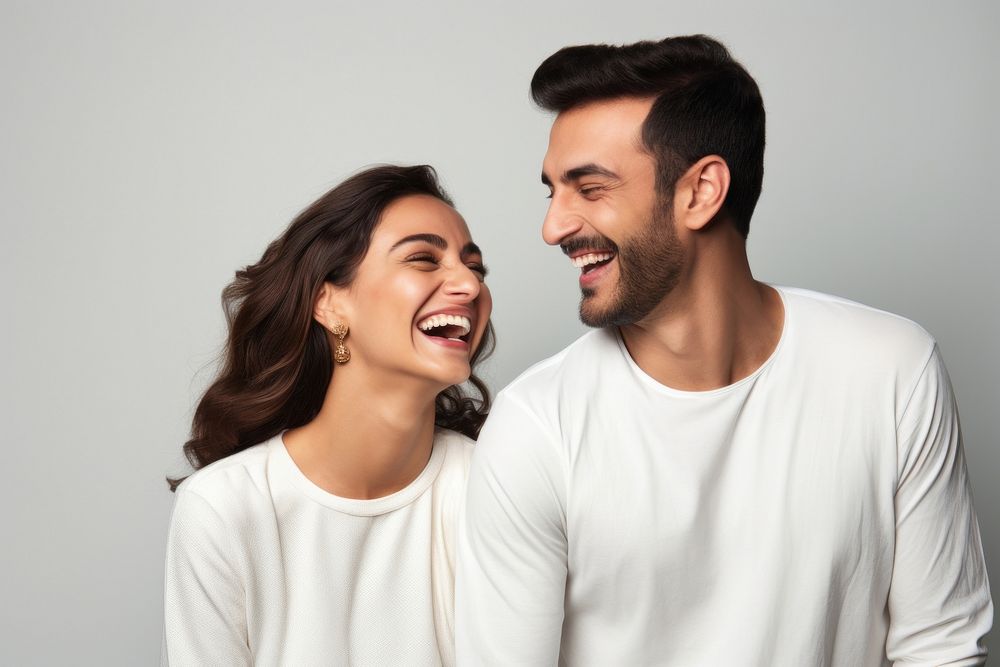 Middle eastern couple laughing adult togetherness. AI generated Image by rawpixel.