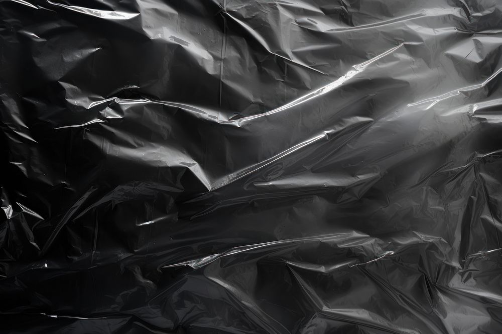 Backgrounds black monochrome crumpled.