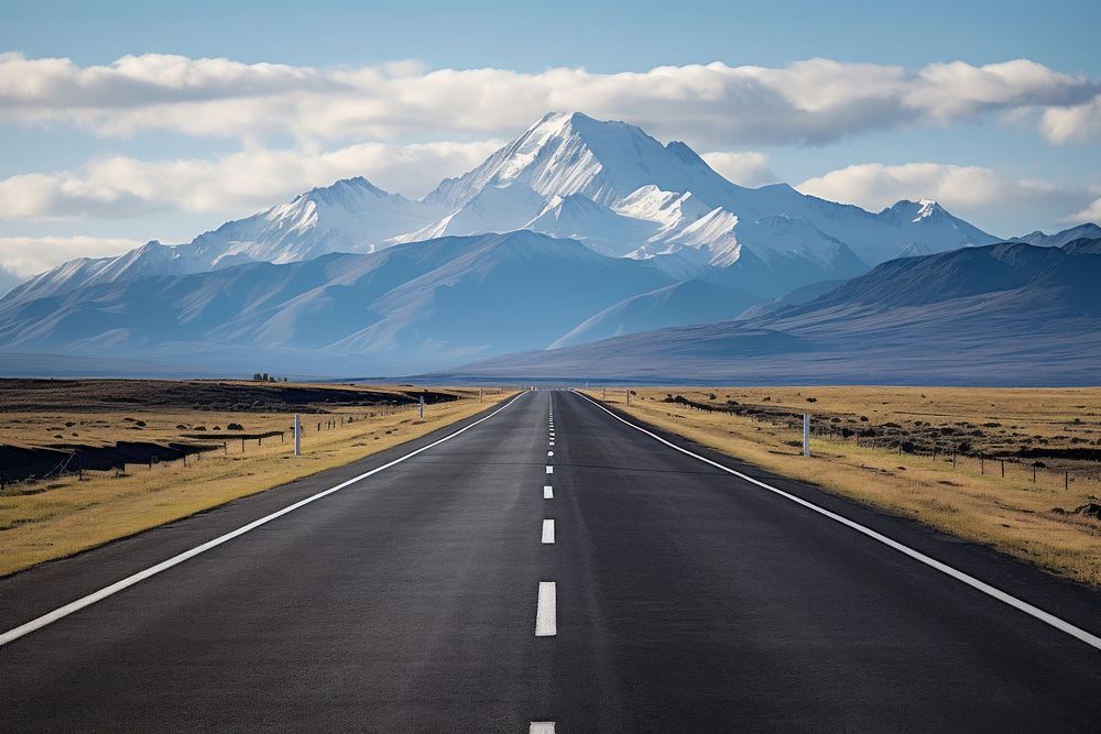 Asphalt road mountain outdoors horizon. AI generated Image by rawpixel.