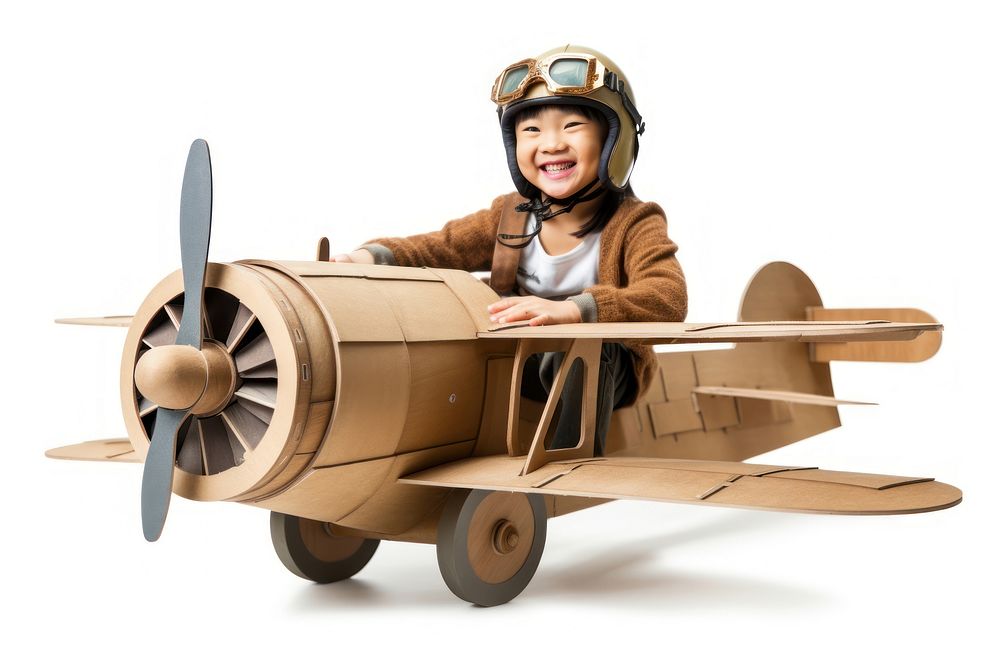 Asian children girl airplane cardboard vehicle. AI generated Image by rawpixel.