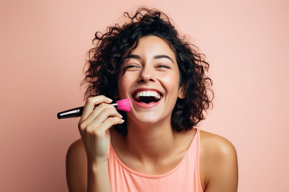 Woman applying mascara laughing happy microphone. AI generated Image by rawpixel.