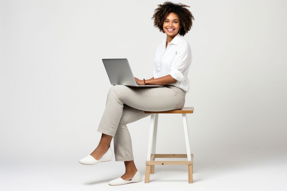 Furniture computer sitting laptop. 