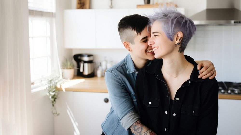 Kissing portrait smiling kitchen. 