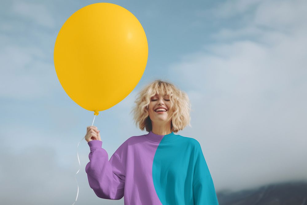 Colorful women's sweaters, yellow balloon