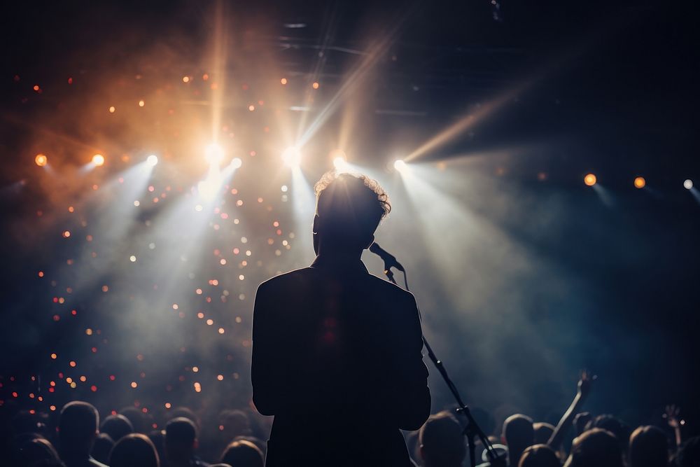 Concert music spotlight musician. AI generated Image by rawpixel.