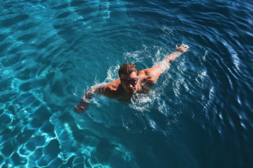 Male swimmer swimming recreation outdoors nature. AI generated Image by rawpixel.