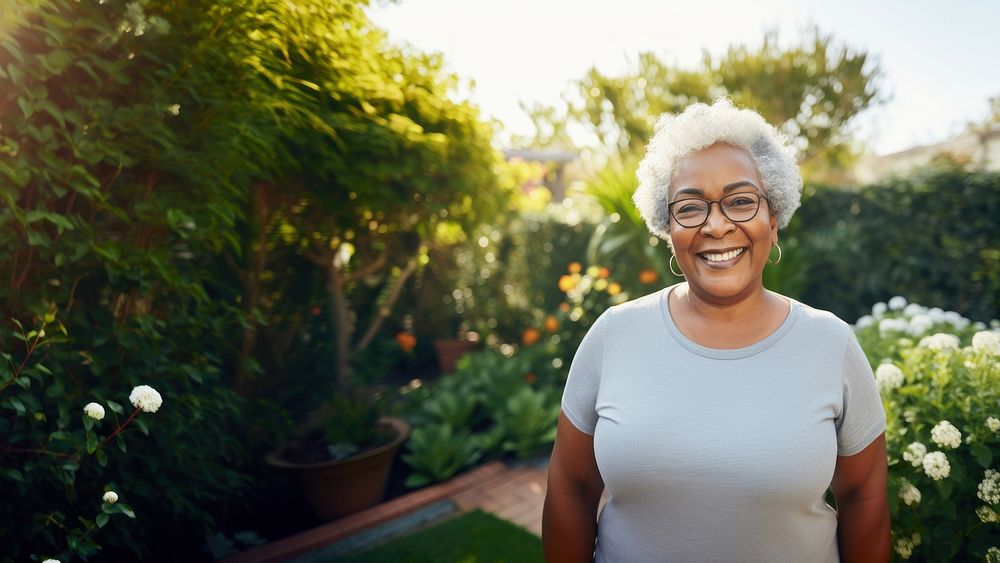 Chubby senior black laughing glasses smile. 