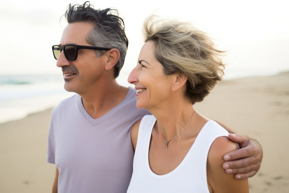 Happy mature couple glasses adult beach. 