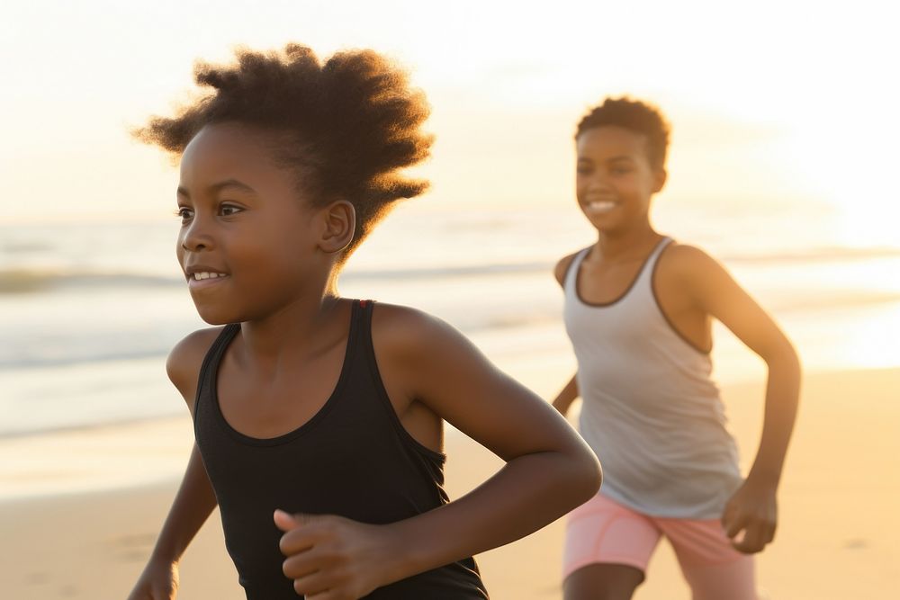 Happy black kids jogging running beach togetherness. 