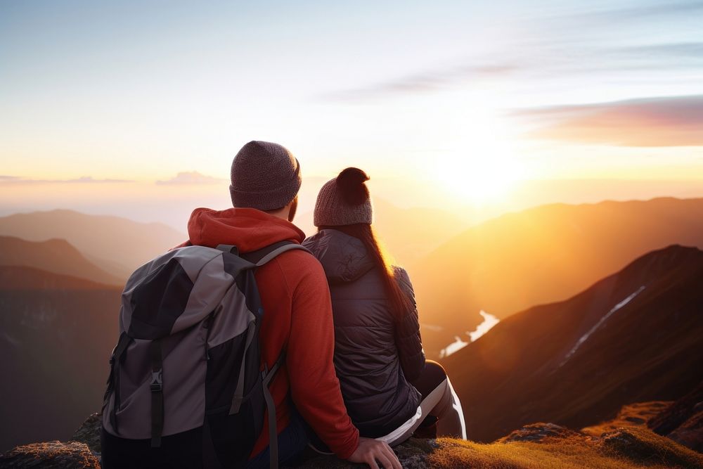 Happy couple backpacker mountain sunset adult. 