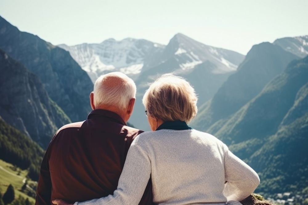 Happy mature couple mountain landscape outdoors. AI generated Image by rawpixel.