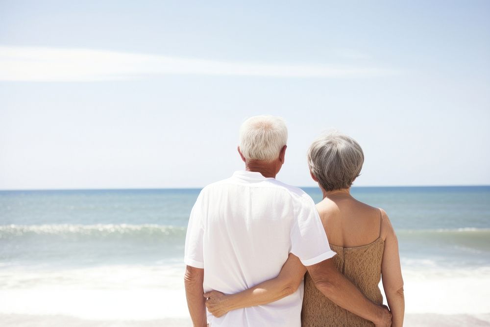 Happy mature couple beach outdoors vacation. AI generated Image by rawpixel.