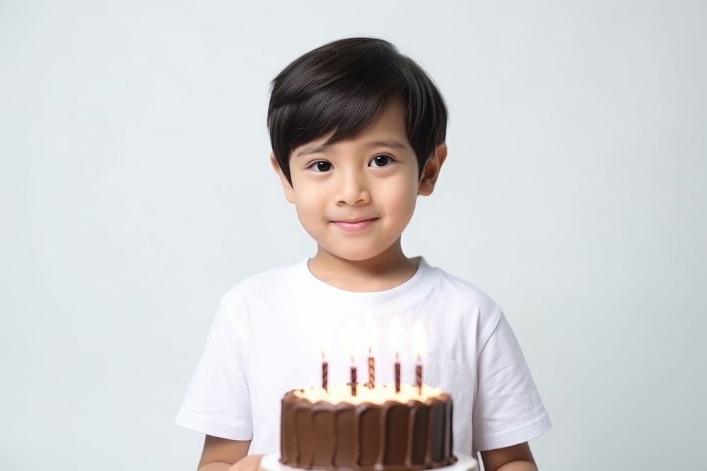 Kid boy happy momen birthday dessert candle party. AI generated Image by rawpixel.