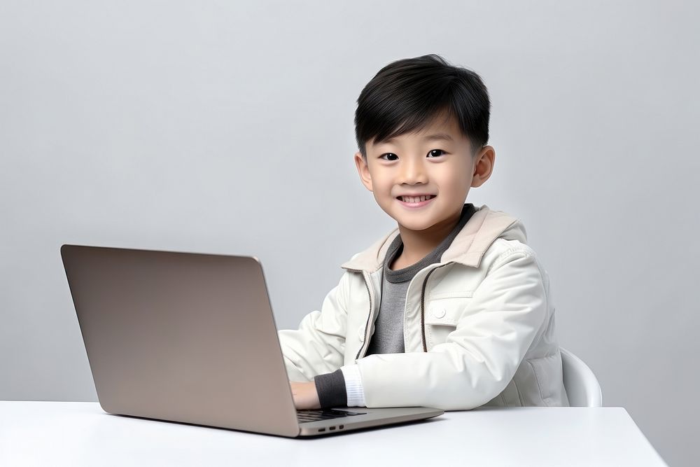 Little asian boy student study online computer laptop smile. AI generated Image by rawpixel.