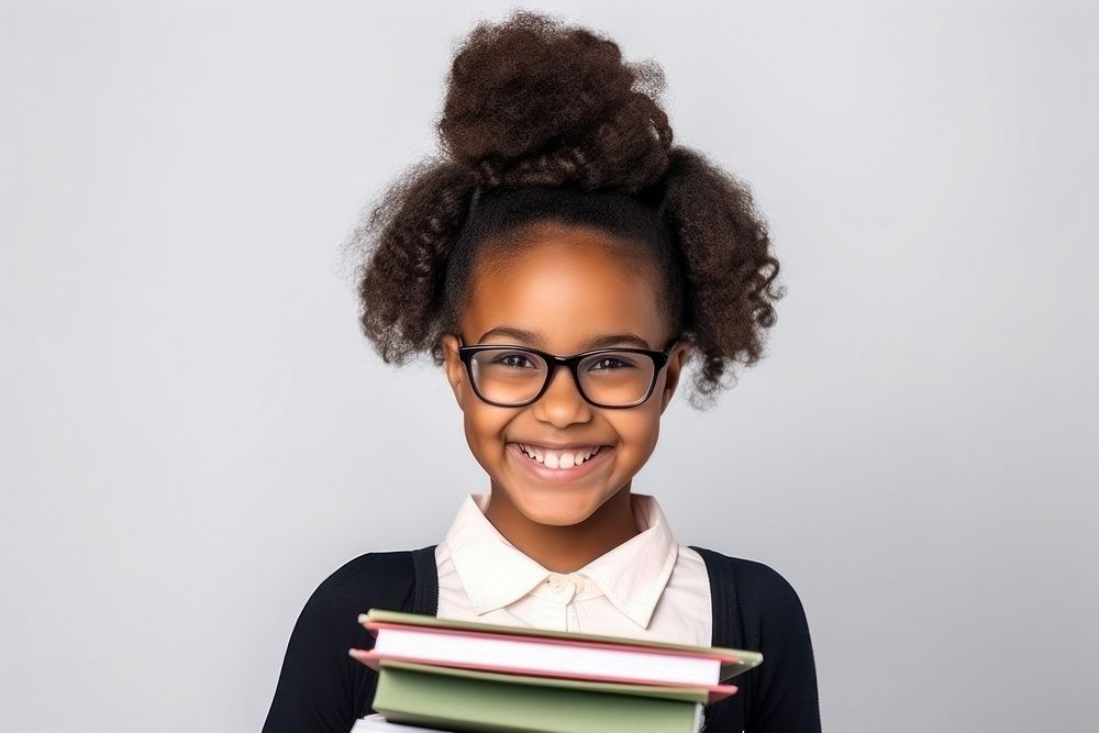Black child school glasses portrait smiling. 