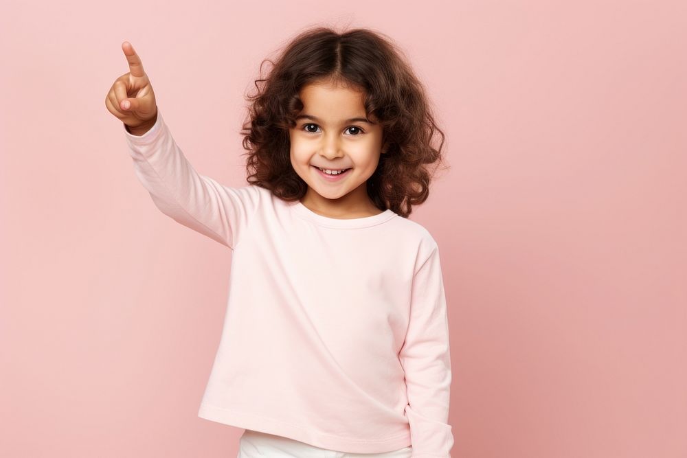 Kid girl pointing portrait smile child. AI generated Image by rawpixel.