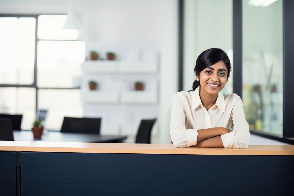 Young Indian businesswoman sitting office adult. AI generated Image by rawpixel.