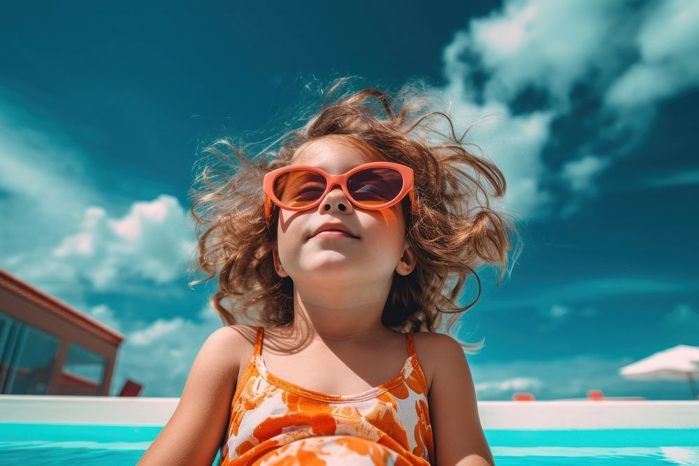 Sunglasses swimming child girl. AI generated Image by rawpixel.