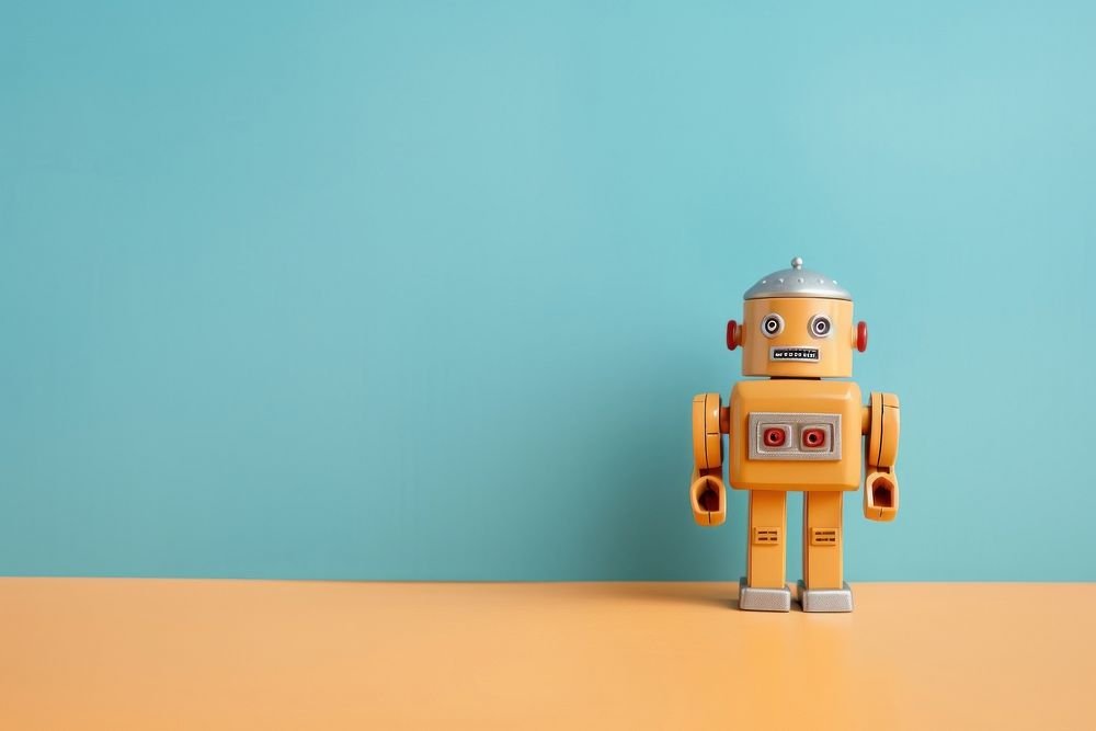 A robot toy astronaut cartoon yellow. AI generated Image by rawpixel.