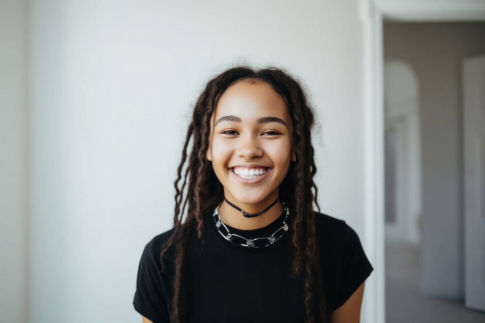 Teen mixed race woman teeth smile individuality architecture. AI generated Image by rawpixel.