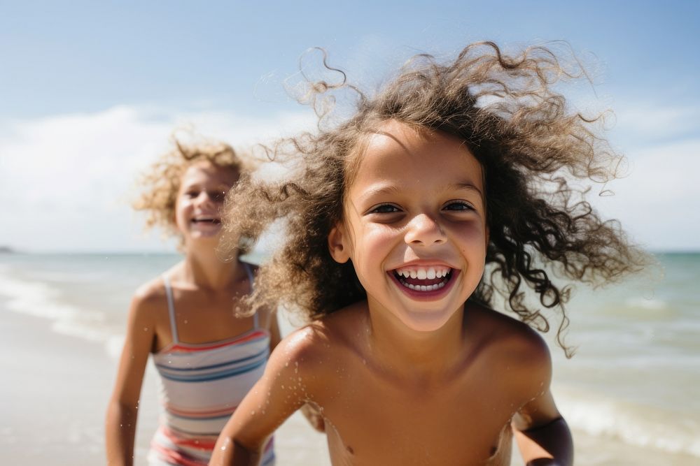 Child beach laughing portrait. AI generated Image by rawpixel.