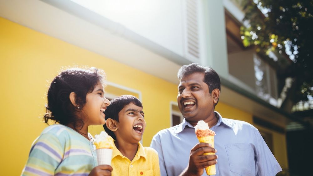 Indian family laughing adult child. 