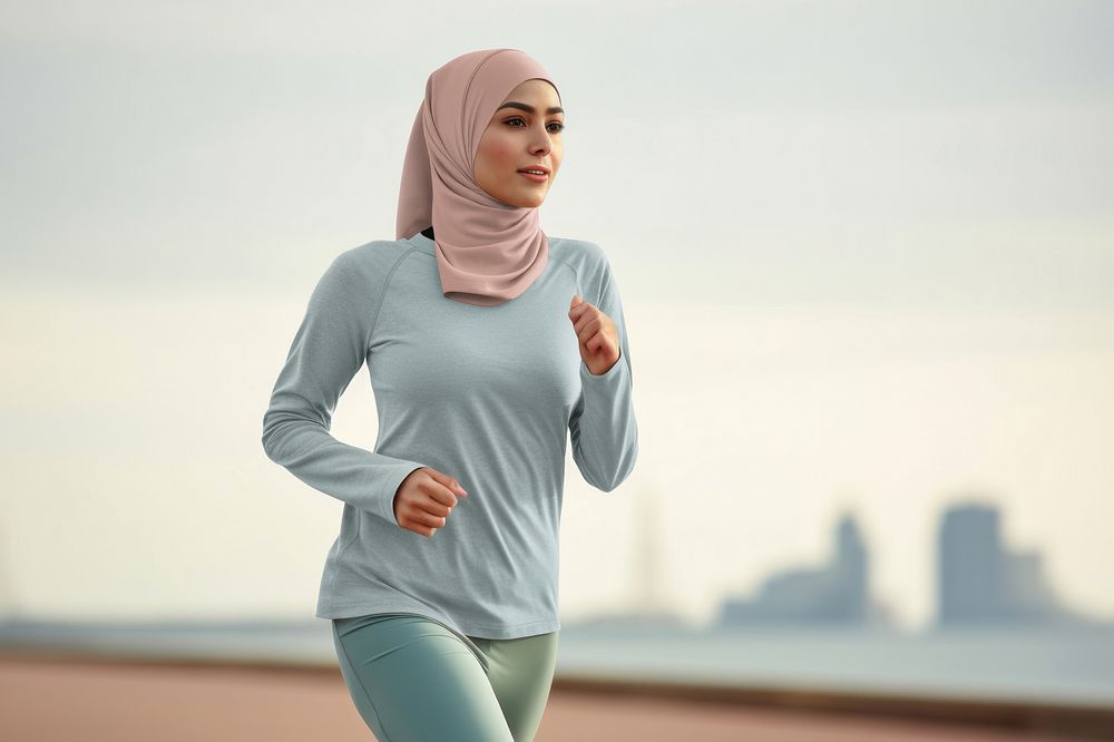 Woman in fashion hijab jogging
