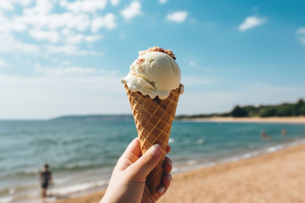 Ice cream dessert holding beach. AI generated Image by rawpixel.