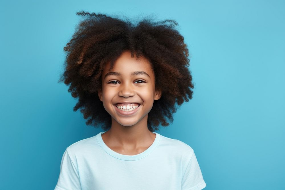 Happy diverse portrait african teen girl smile blue head. AI generated Image by rawpixel.