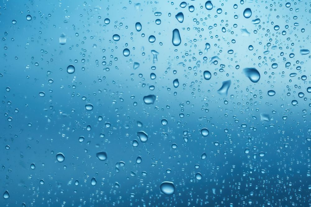 Realistic water drops on window transparent backgrounds outdoors.