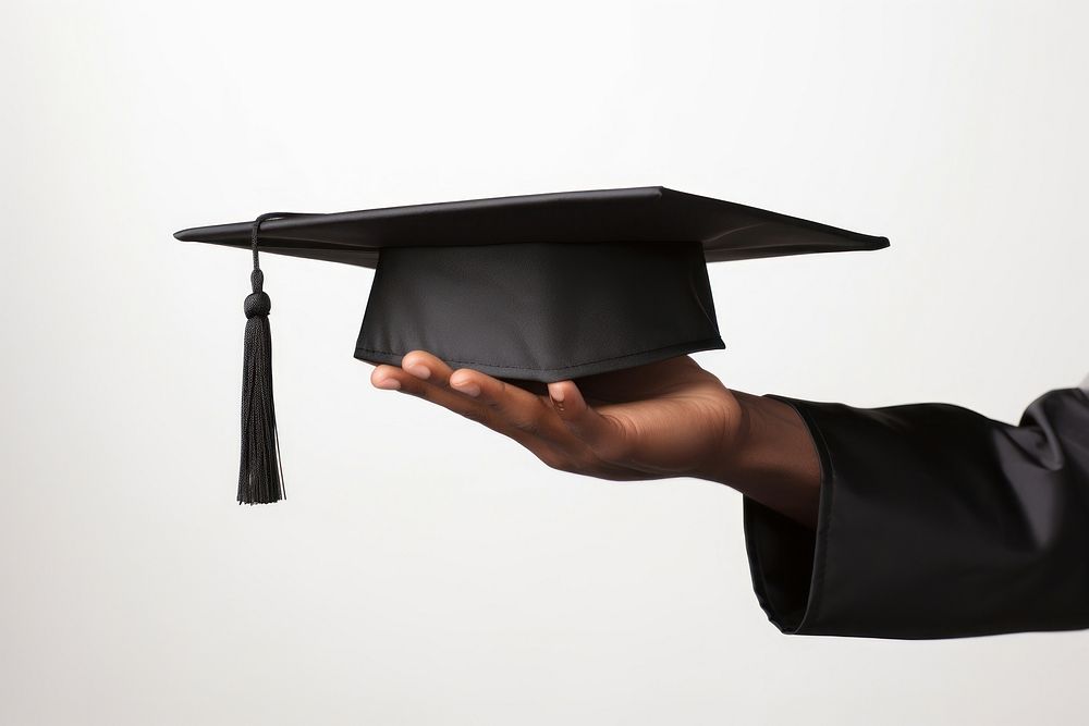 Hand holding graduation hat adult intelligence achievement. AI generated Image by rawpixel.