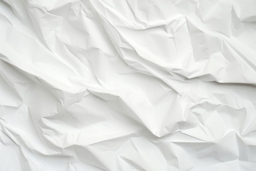 White crumpled and creased paper backgrounds wrinkled textured.