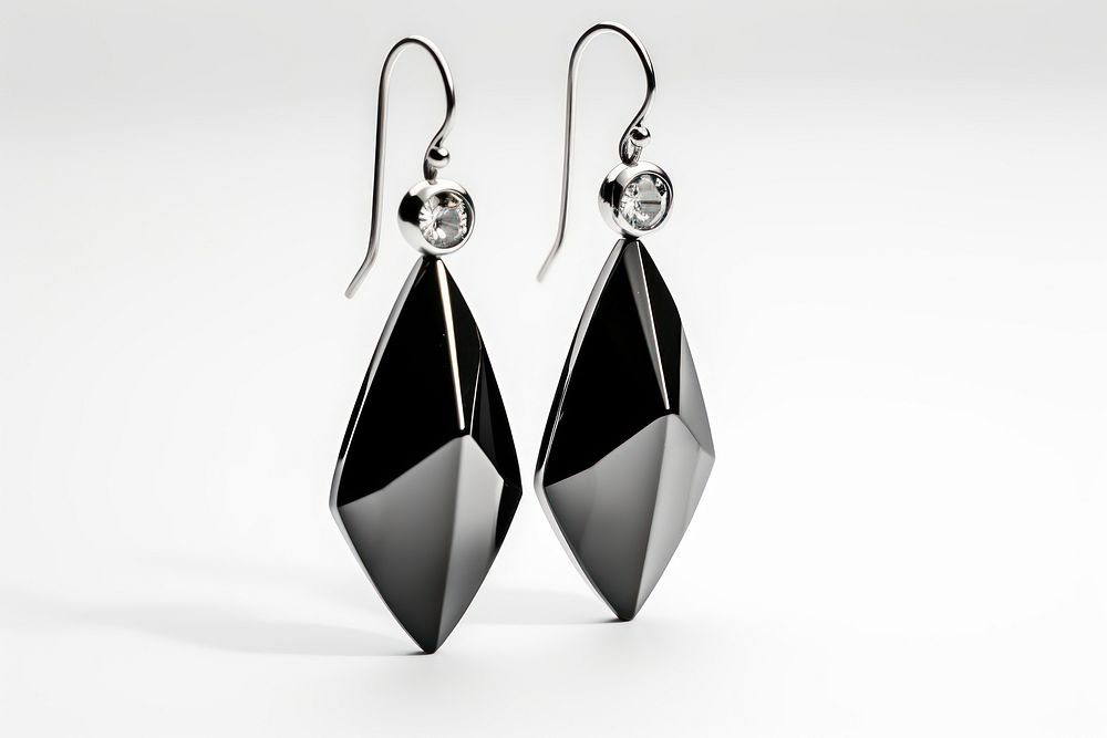 Earrings jewelry black white background. AI generated Image by rawpixel.