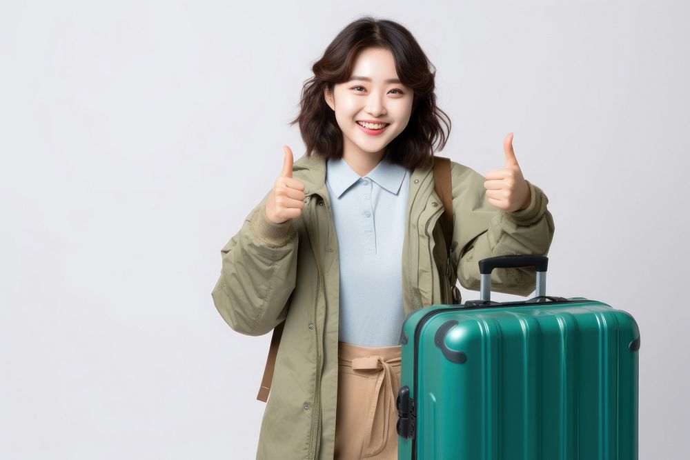Young Asian tourist woman luggage holding smile. AI generated Image by rawpixel.