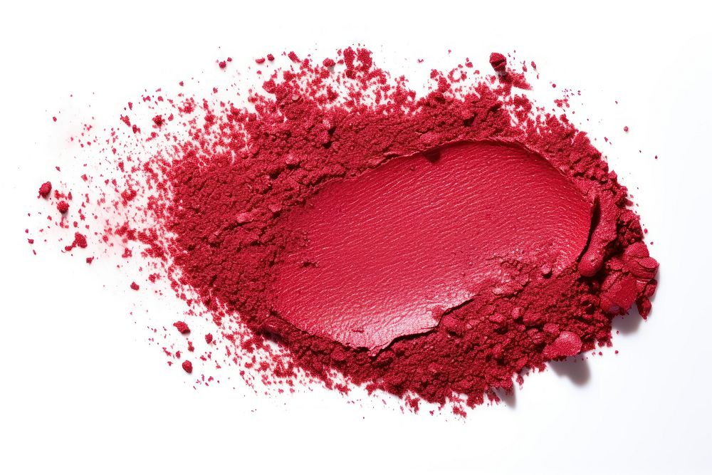 Cosmetics powder splattered lipstick.