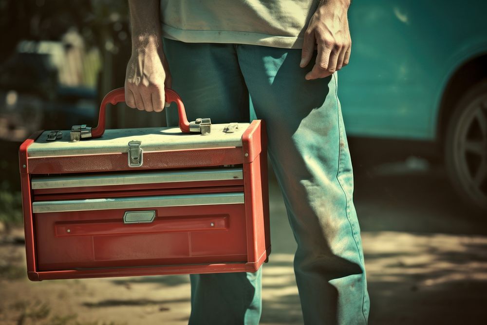 Toolbox luggage adult bag. AI generated Image by rawpixel.