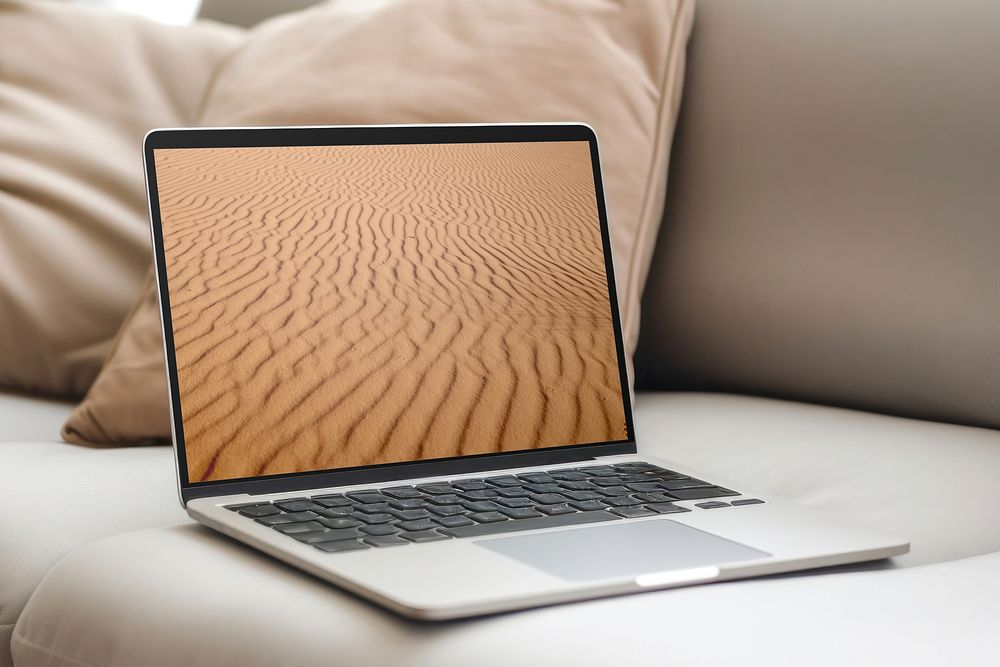 Laptop screen with desert wallpaper