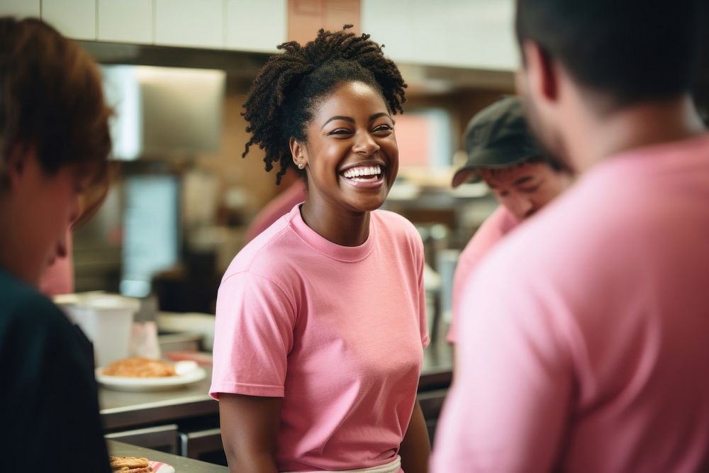A black woman fast food employee laughing adult togetherness. AI generated Image by rawpixel.
