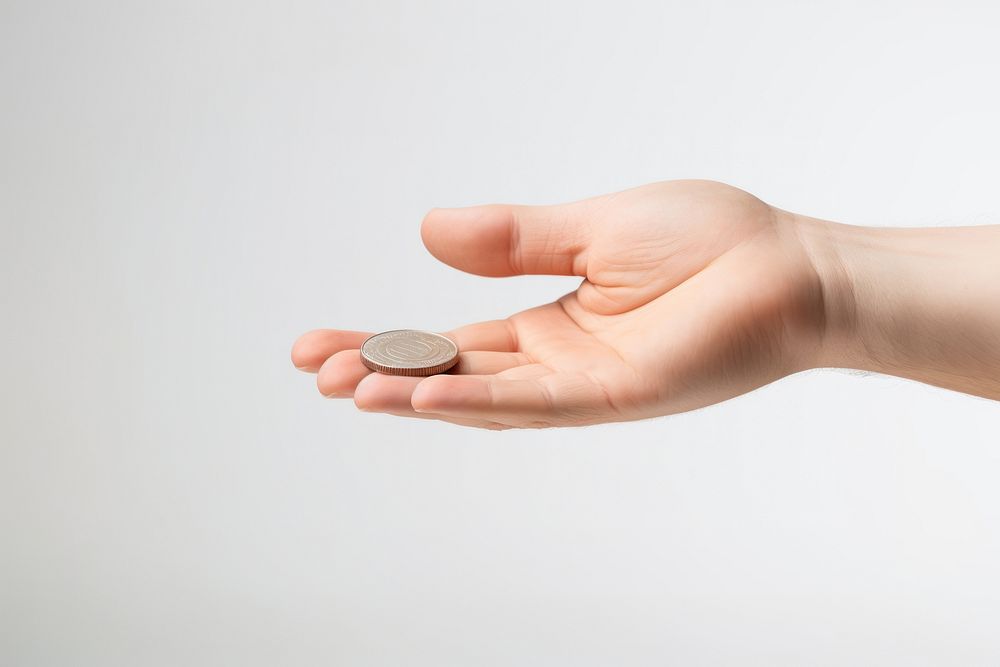 Hand tossing a coin. AI generated Image by rawpixel.
