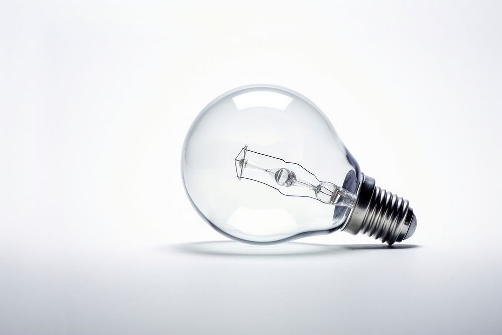Glass lighting bulb lightbulb electricity illuminated. AI generated Image by rawpixel.