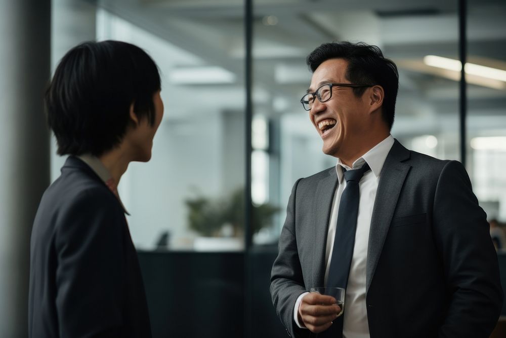 Asian multiethnic business people talk togerther conversation office adult. AI generated Image by rawpixel.