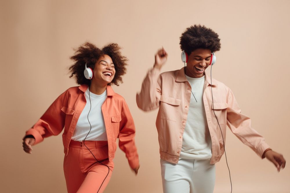 Headphones cheerful laughing dancing. AI generated Image by rawpixel.