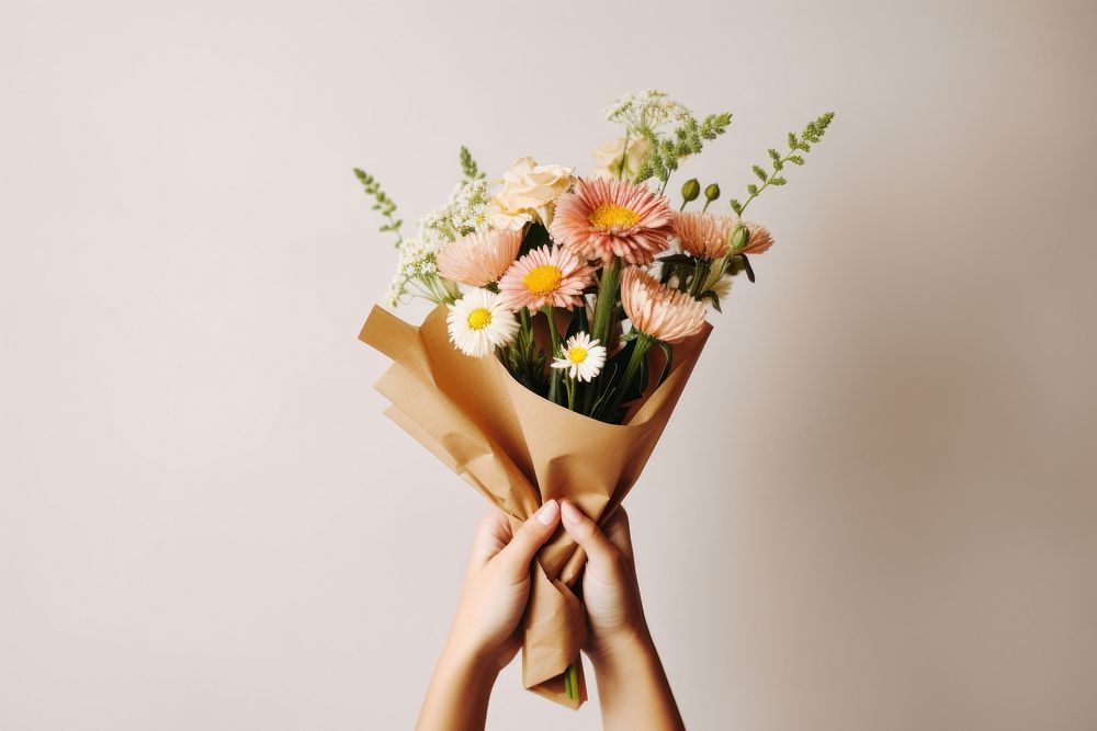 Holding flower bouquet plant paper hand. AI generated Image by rawpixel.