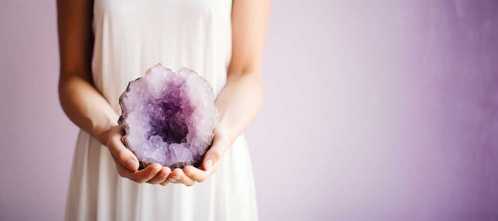 Amethyst jewelry holding purple. 