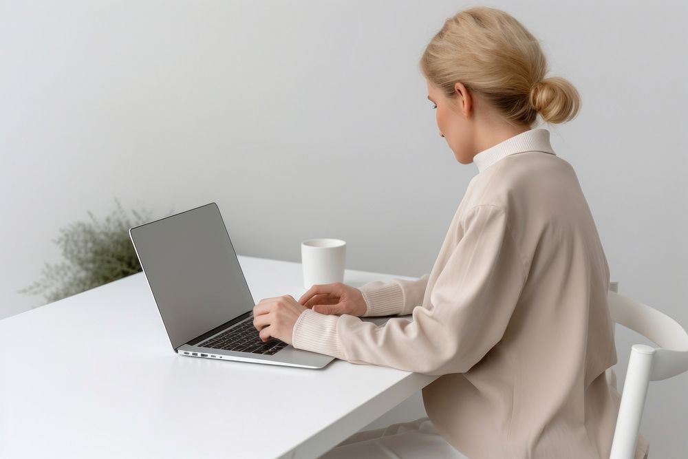 Woman using laptop furniture computer sitting. AI generated Image by rawpixel.