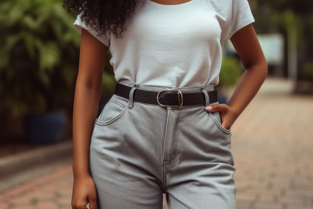 Black woman waist wearing baggy low rise jeans belt accessories midsection. AI generated Image by rawpixel.